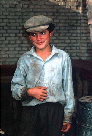 Young man at animal market in Kasgar, China.